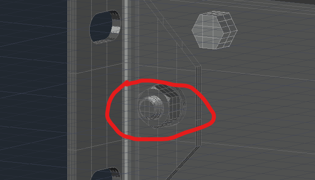 A close up of a screw

Description automatically generated